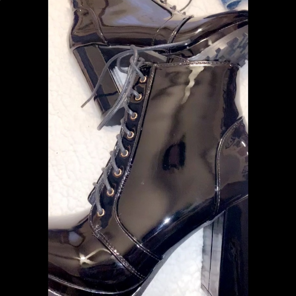 Platform vinyl heeled boots